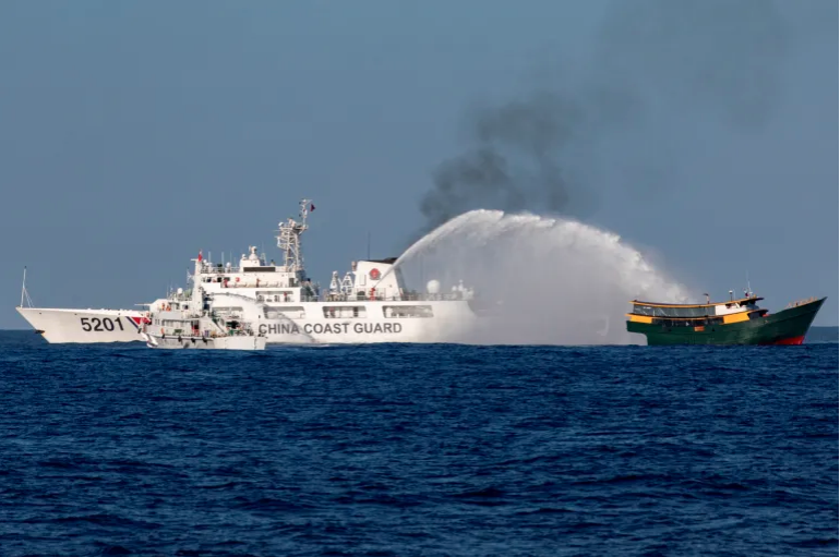 Philippines summons Beijing envoy over South China Sea water cannon attack
