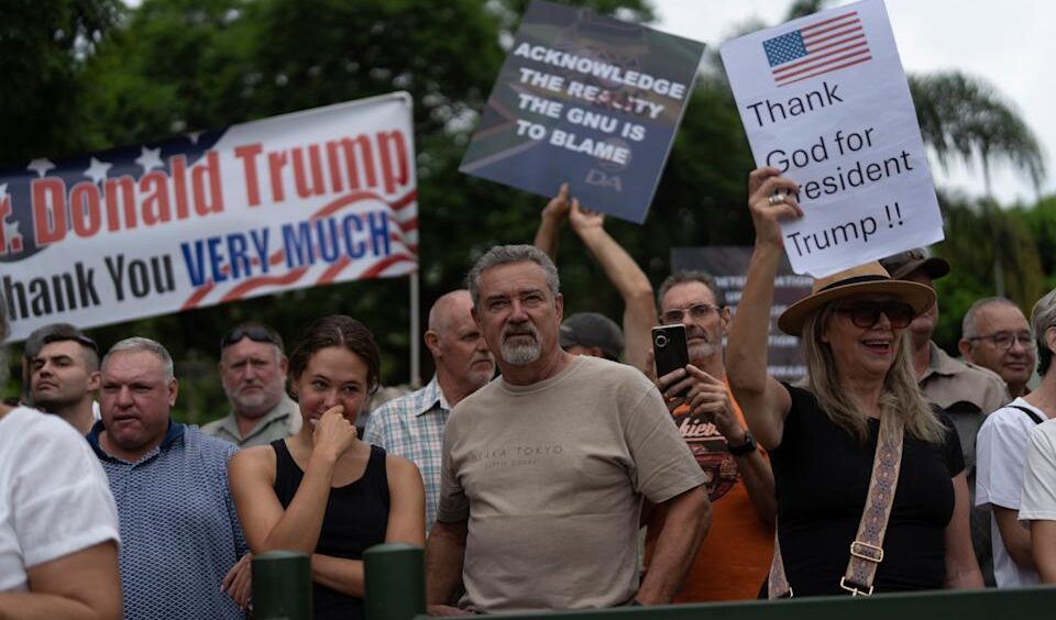 White South African Refugees Arrive in U.S. Under Trump Policy, Stirring Controversy