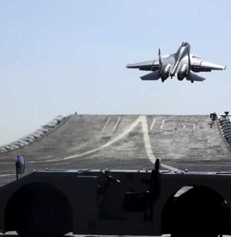 Chinese Fighter Jets Buzz Japanese Patrol Planes Amid Dual Carrier Deployment in Pacific