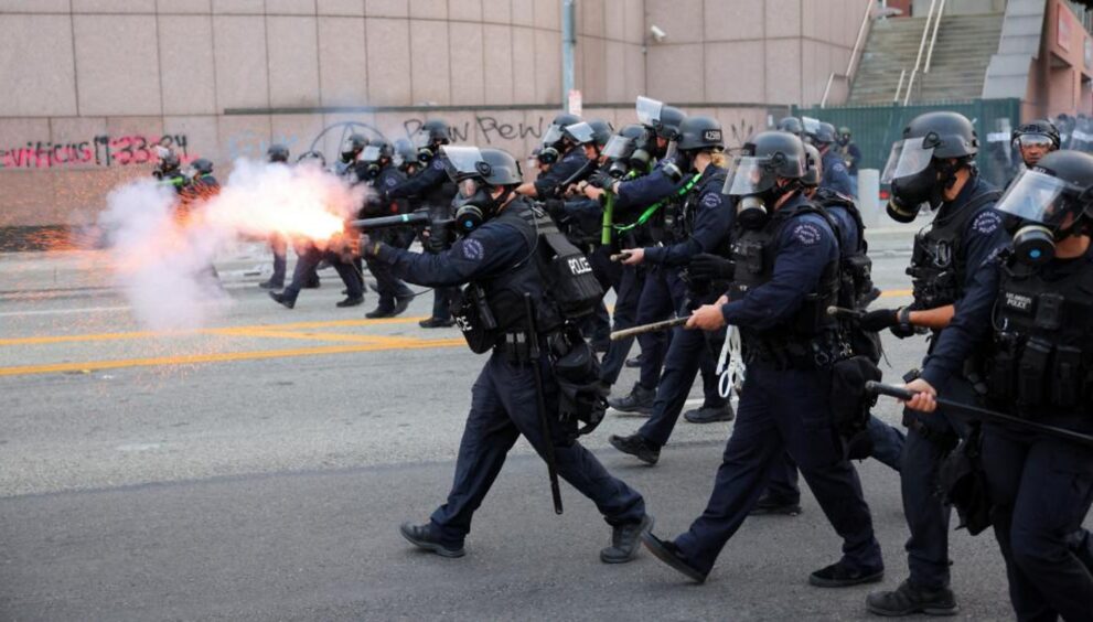 Riot Police and Protesters Clash in Downtown LA After Federal Immigration Raids