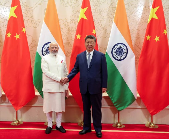 Xi and Modi Pledge New Era of Trust as China-India Relations Warm at SCO Summit