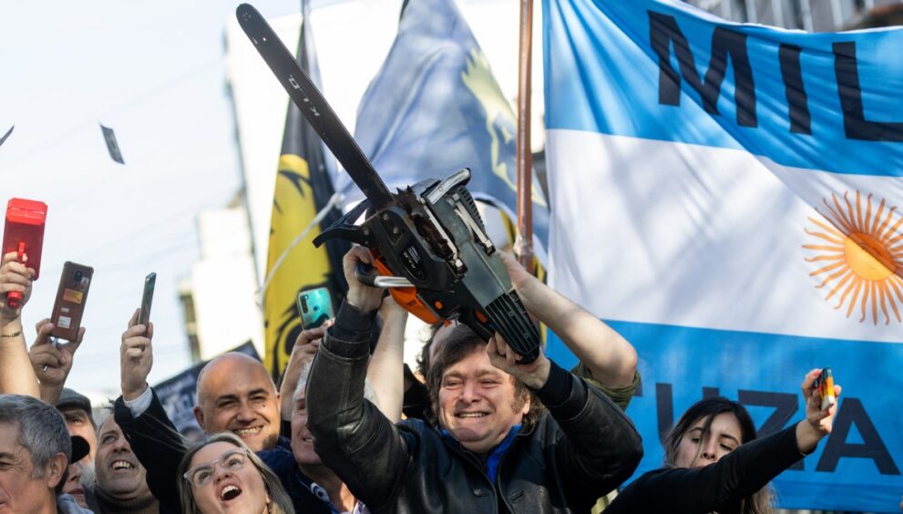 Argentina’s President Milei Escorted Away as Protesters Hurl Objects at Vehicle