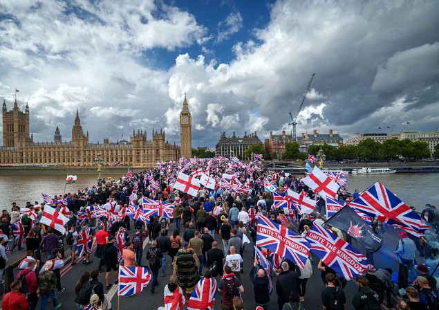 Police and Protesters Scuffle as 110,000 Join Anti Migrant London Protest