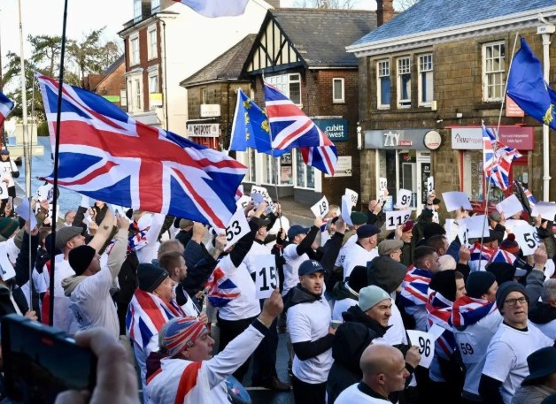 UK Anti-Immigration Protests Erupt Over Asylum Seeker Camp at Army Site
