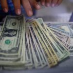 Ghana’s Cedi Seen Weakening as Nigeria’s Naira Holds Steady